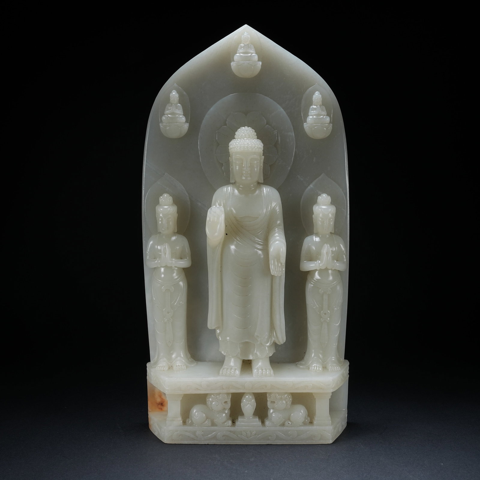 A HETIAN JADE BUDDHIST PLAQUE WITH ONE BUDDHA AND TWO ATTENDANTS: Hetian Jade Buddhist Plaque with One Buddha and Two Attendants
