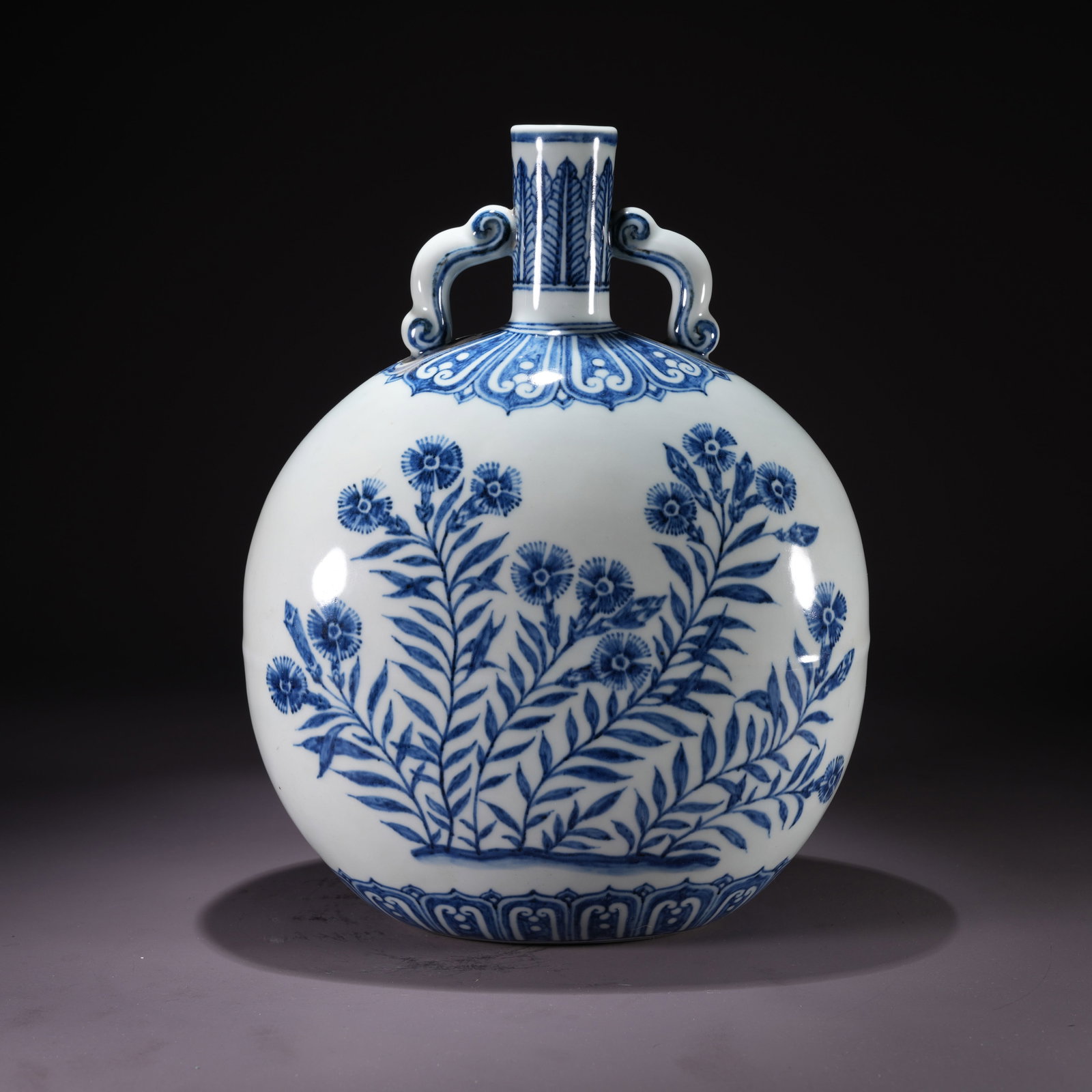 A BLUE-AND-WHITE MOON FLASK WITH FLORAL MOTIF (1 of 9)