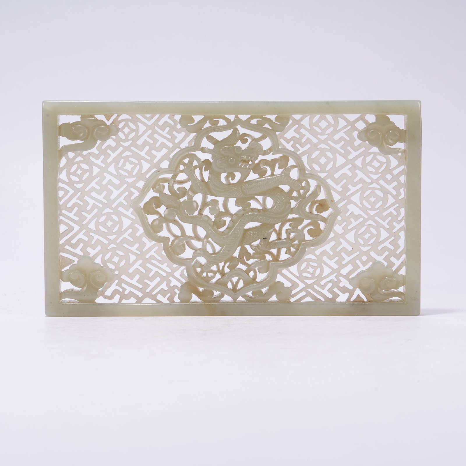 A HETIAN JADE PLAQUE WITH DRAGON AMID FLORALS (1 of 9)