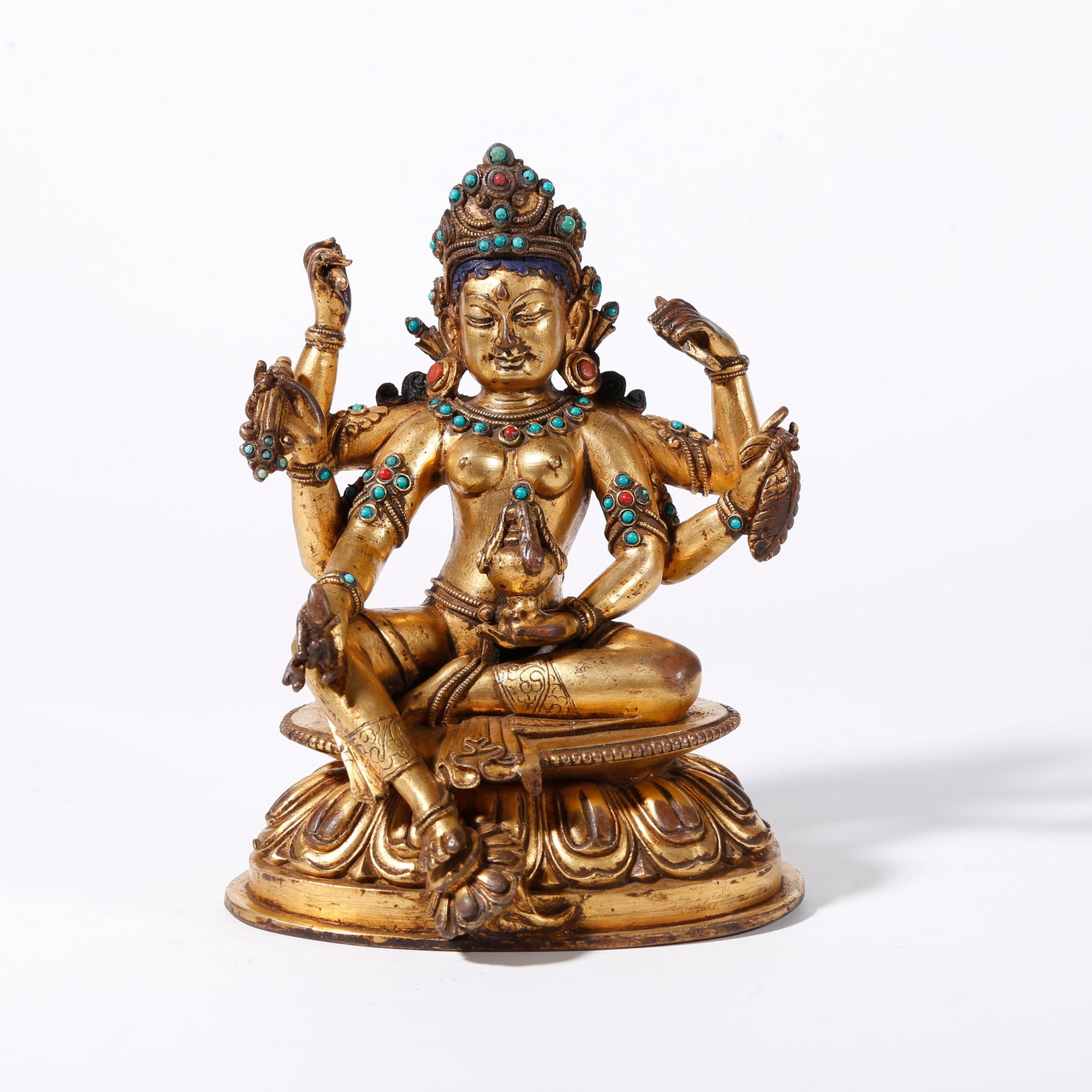 A GILT BRONZE STATUE OF VASUDHARA: Gilt Bronze Statue of Vasudhara