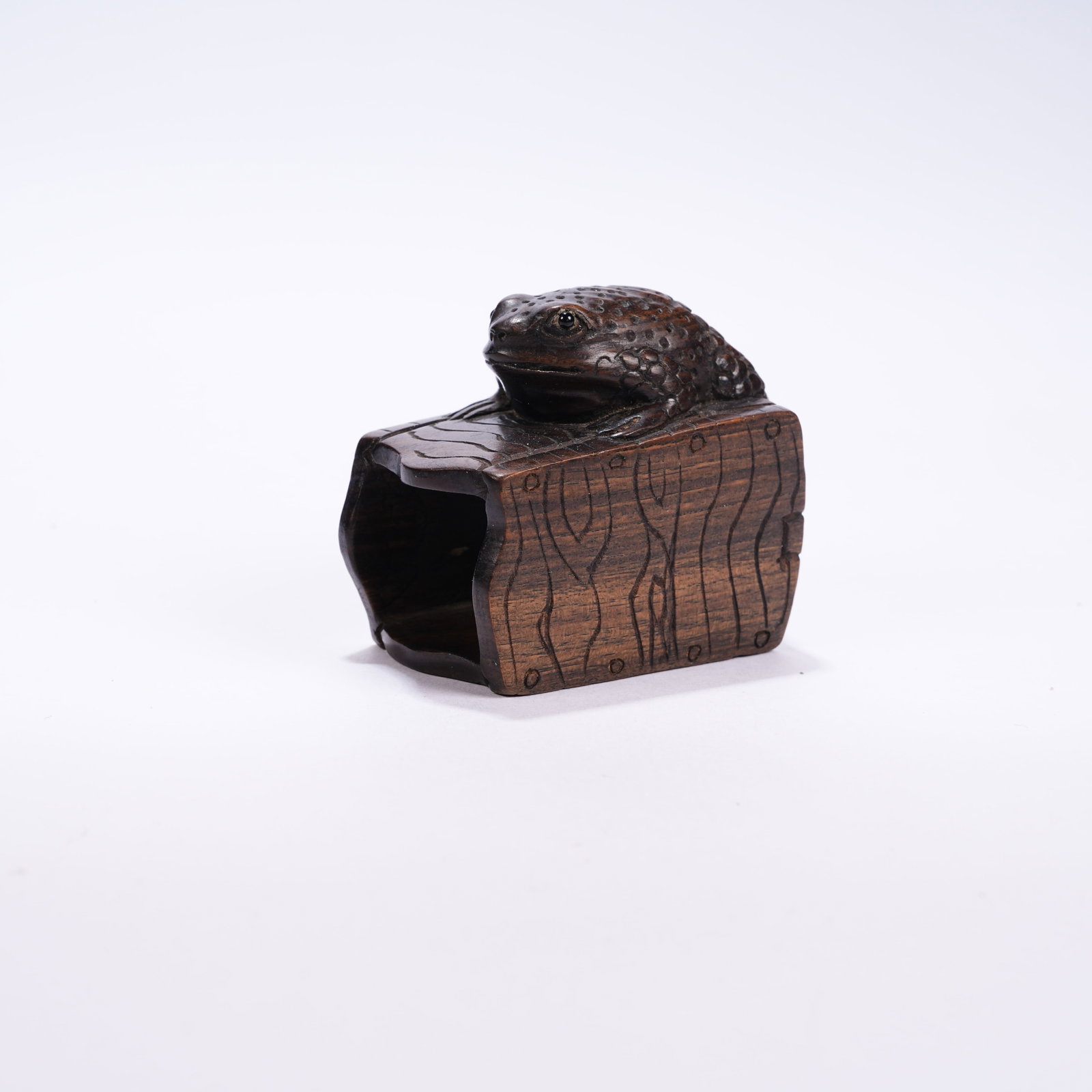 A YELLOW PEAR WOOD FORTUNE ORNAMENT: Yellow Pear Wood Fortune Ornament