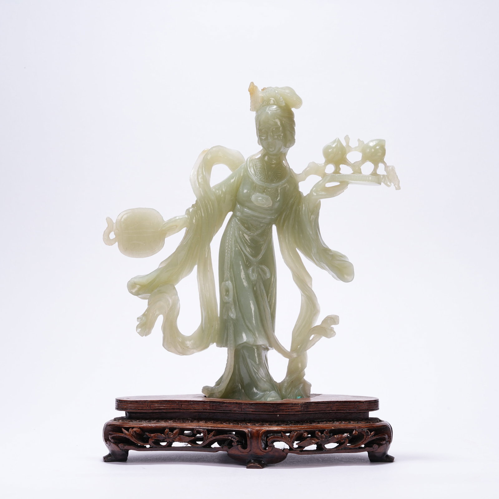 A NEPHRITE STANDING BEAUTY FIGURINE: Nephrite Standing Beauty Figurine