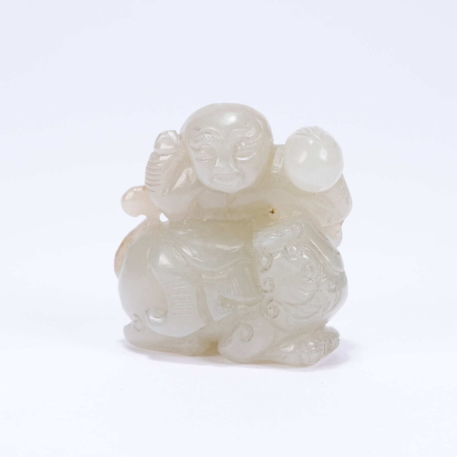 A HETIAN JADE BOY PLAYING WITH LION PENDANT (1 of 8)