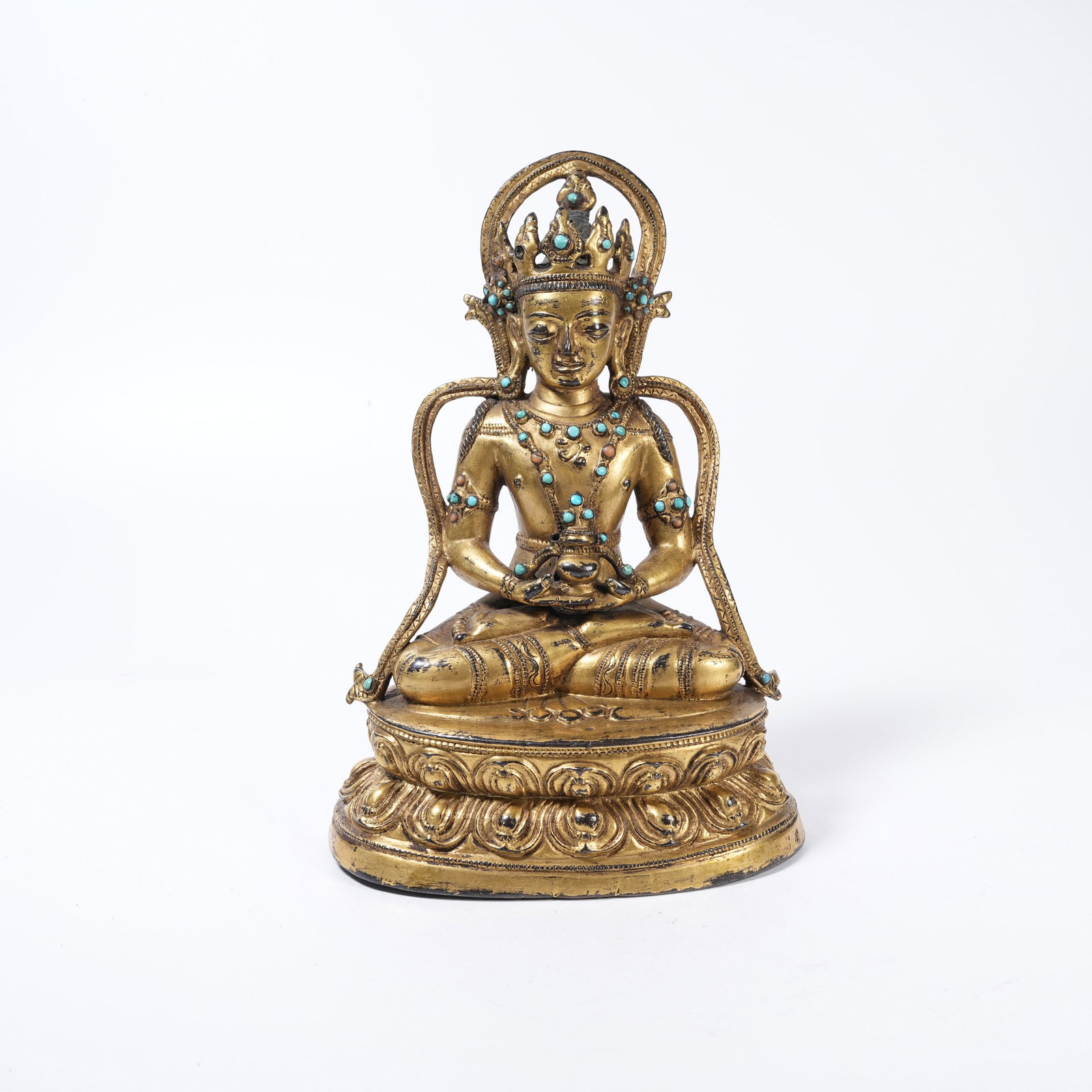 A GILDED BRONZE STATUE OF AMITAYUS INLAID WITH TURQUOISE: Gilded Bronze Statue of Amitayus Inlaid with Turquoise