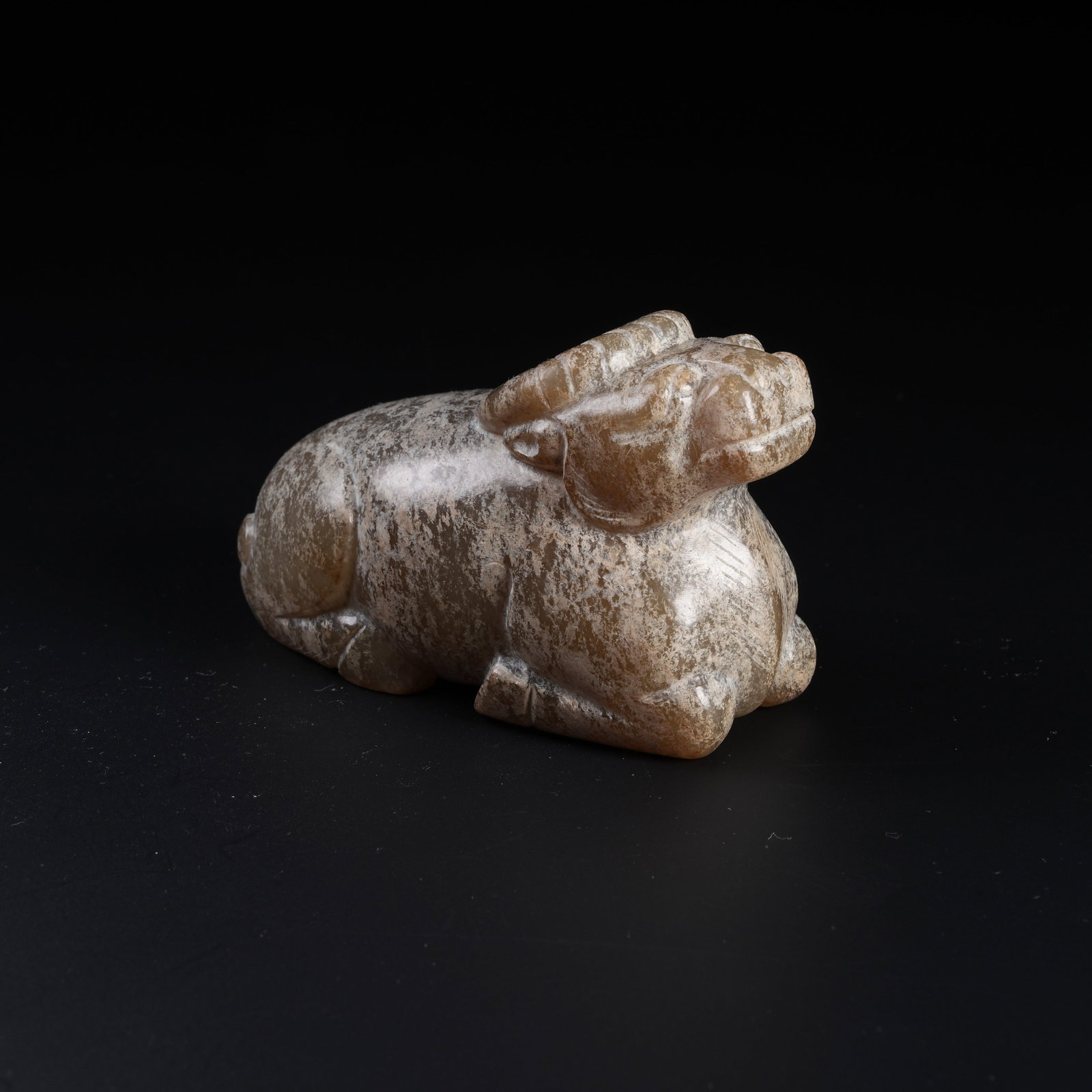 A ANCIENT JADE ORNAMENT OF RECLINING OX: Ancient Jade Ornament of Reclining Ox