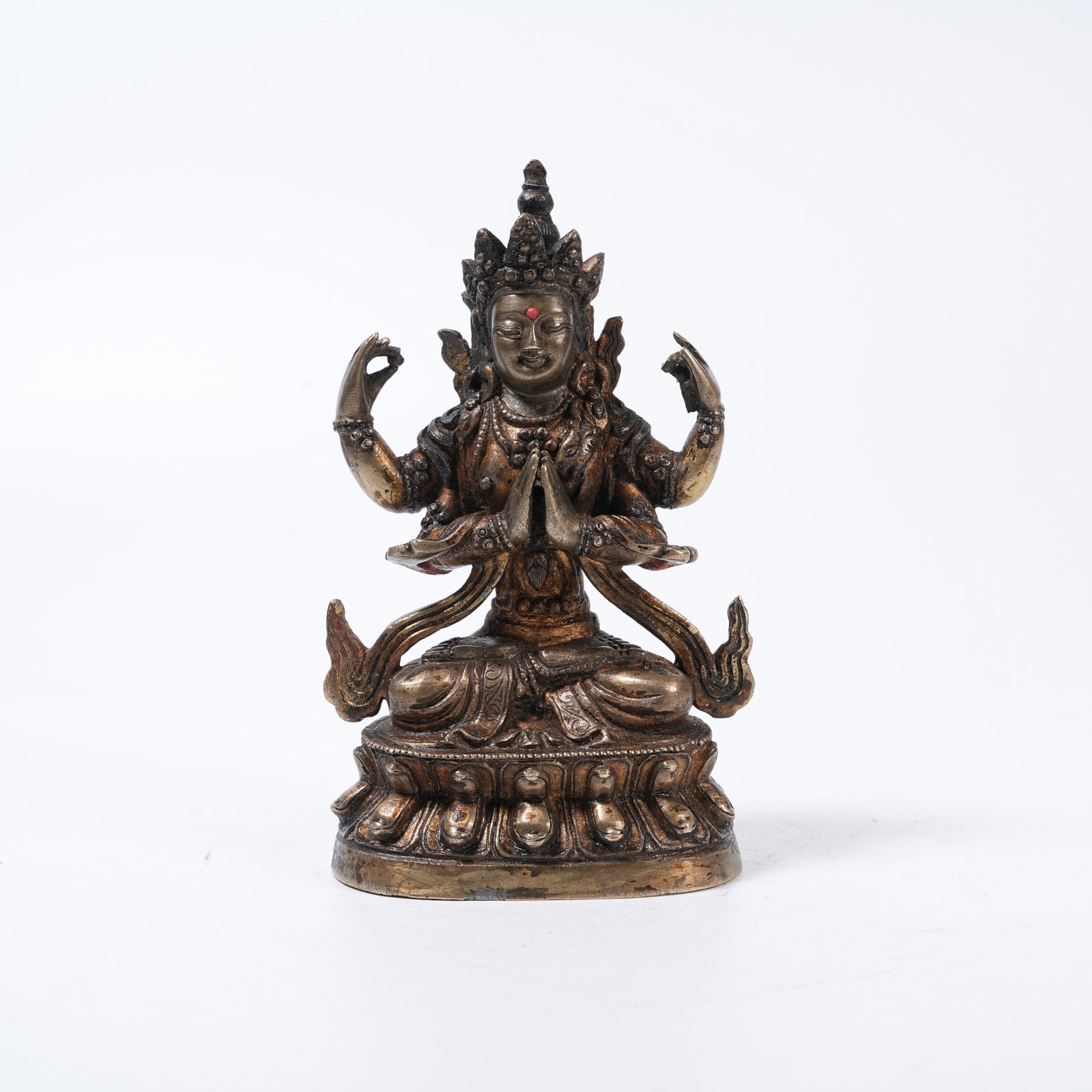 A BRONZE STATUE OF FOUR-ARMED GUANYIN: Bronze Statue of Four-Armed Guanyin