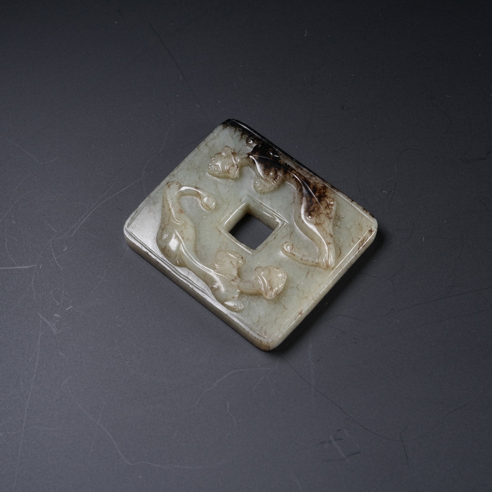 A ANCIENT JADE PENDANT CARVED WITH CHI DRAGON PATTERNS: Ancient Jade Pendant Carved with Chi Dragon Patterns