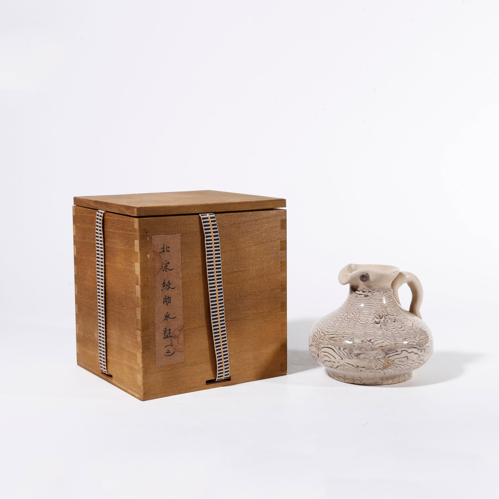 A MARBLED CLAY WATER DROPPER (1 of 10)