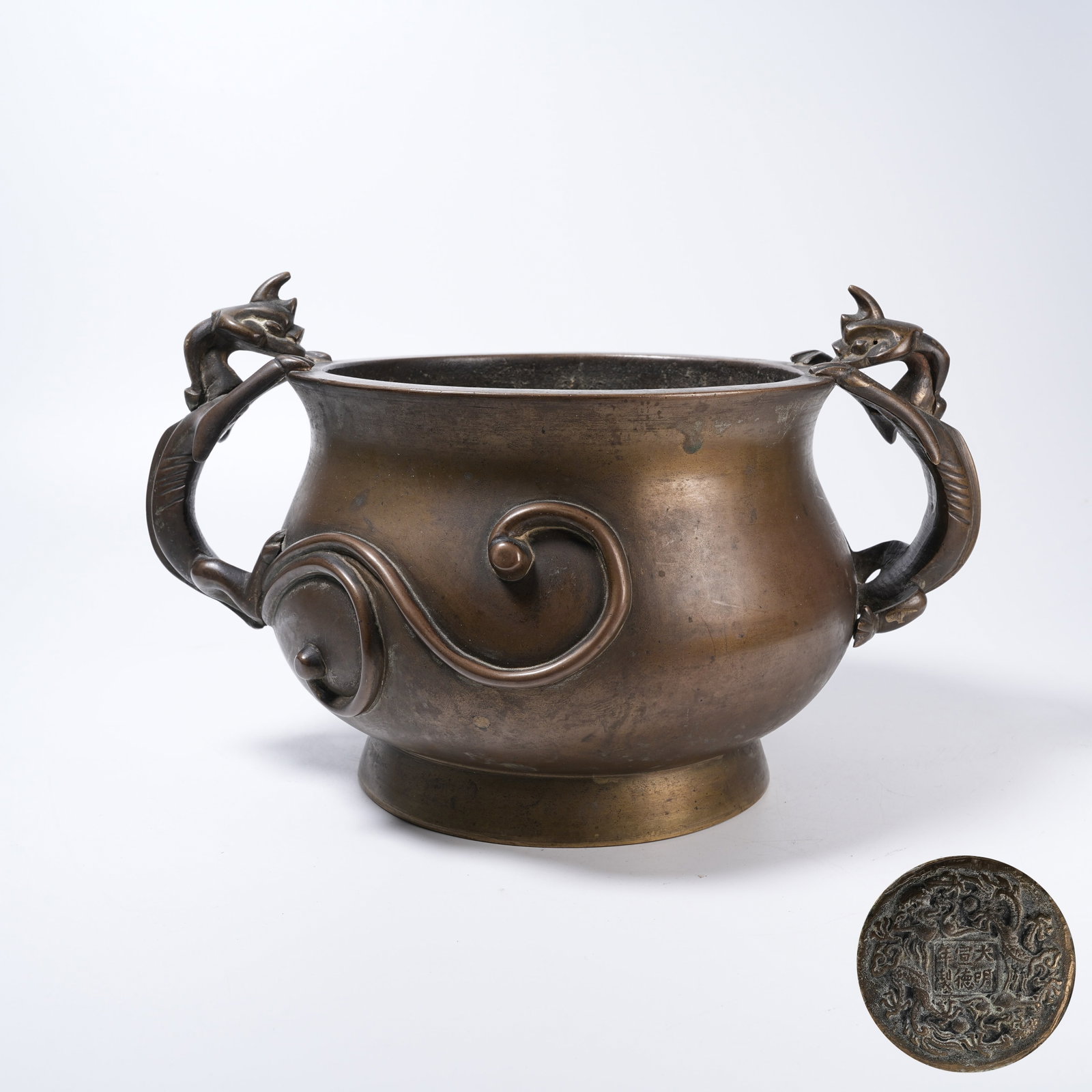A BRONZE CENSER WITH CHI DRAGON HANDLES: Bronze Censer with Chi Dragon Handles