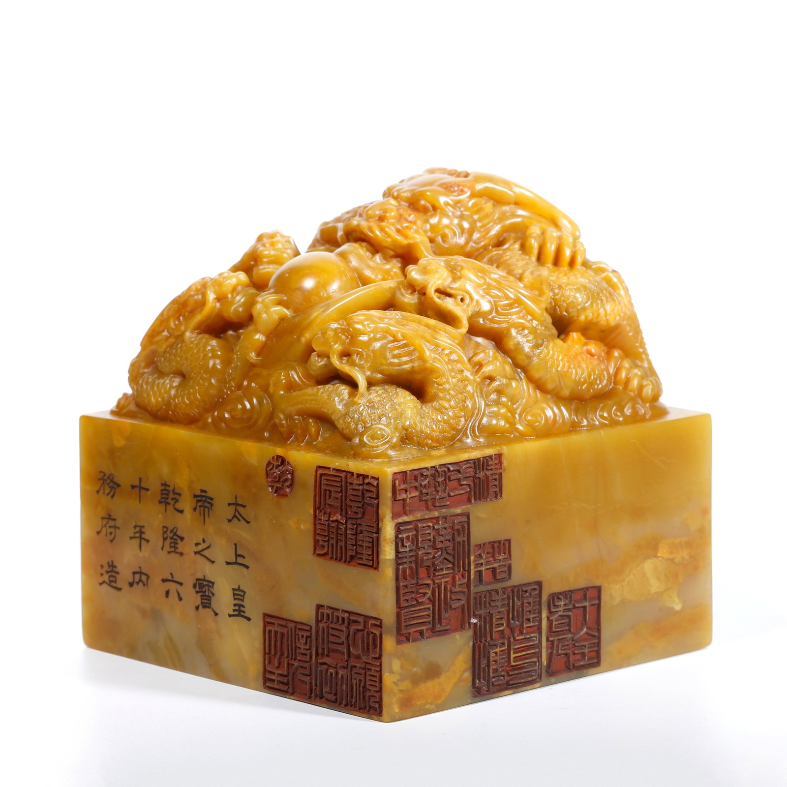 A SEAL CARVED WITH FIVE-DRAGON PATTERN FROM SHOUSHAN TIANHUANG STONE: Seal carved with five-dragon pattern from Shoushan Tianhuang stone
