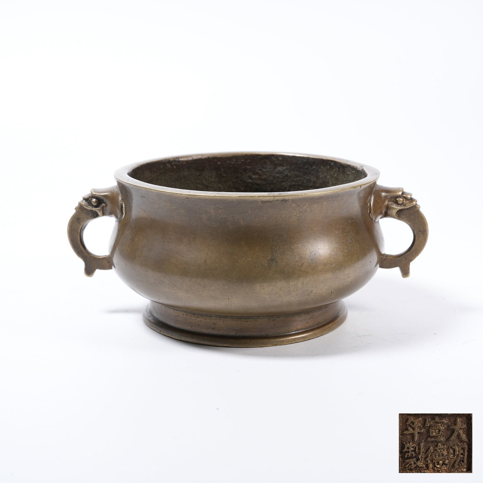A BRONZE CENSER WITH DRAGON EARS: Bronze Censer with Dragon Ears