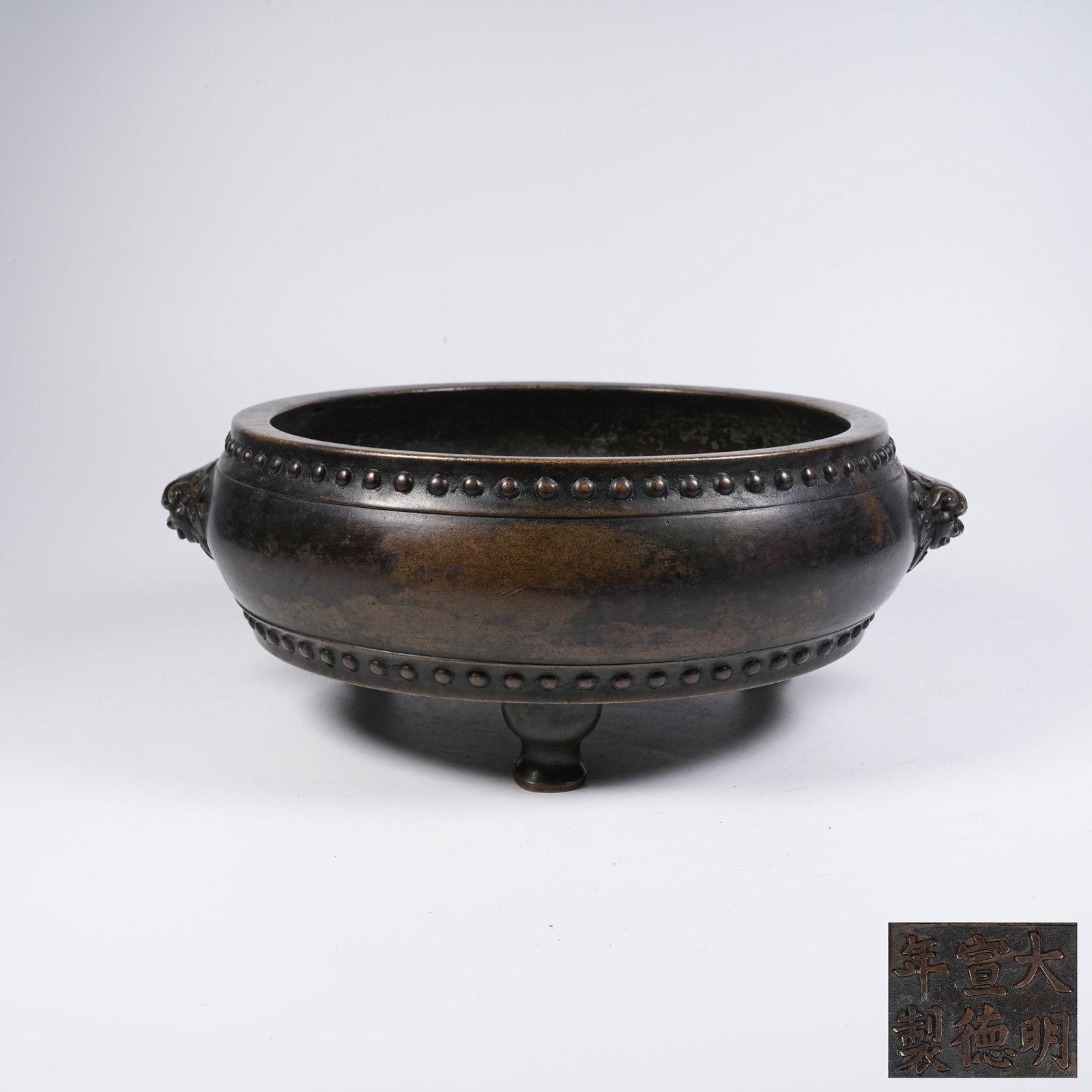 A BRONZE DRUM-SHAPED CENSER WITH LION EARS: Bronze Drum-shaped Censer with Lion Ears