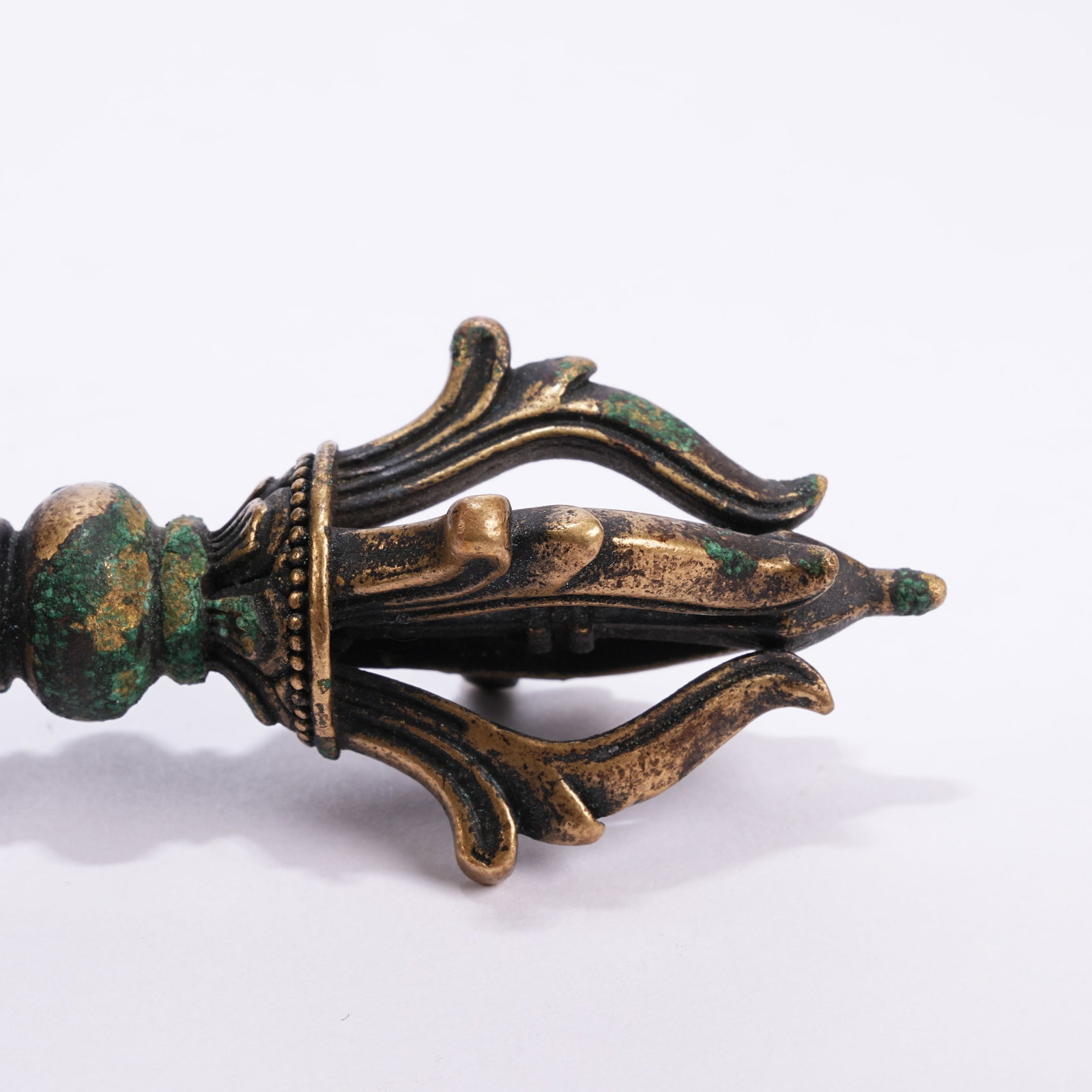 A BRONZE RITUAL IMPLEMENT - 5