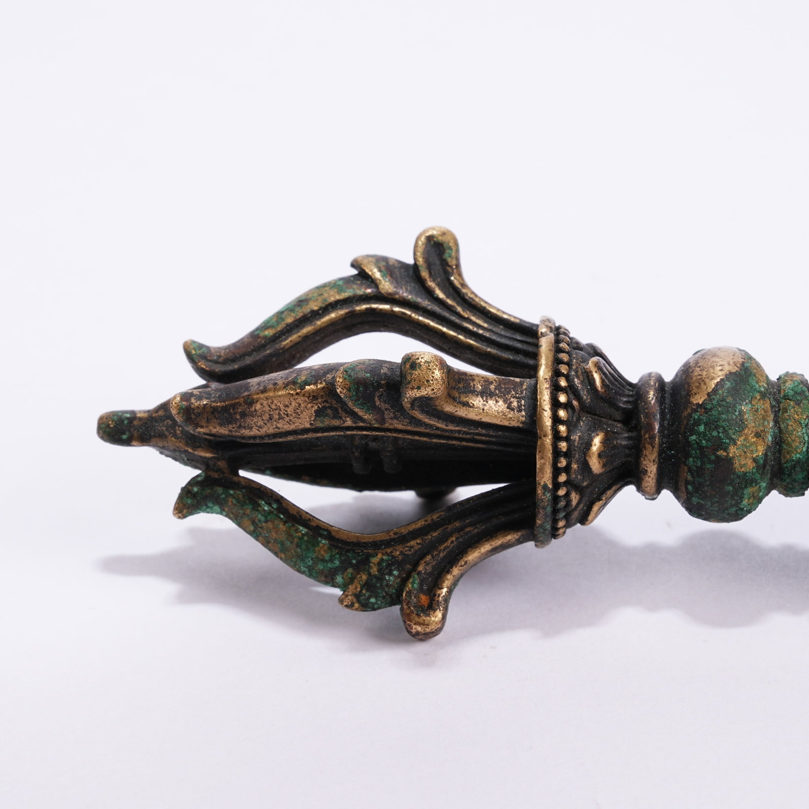 A BRONZE RITUAL IMPLEMENT - 6