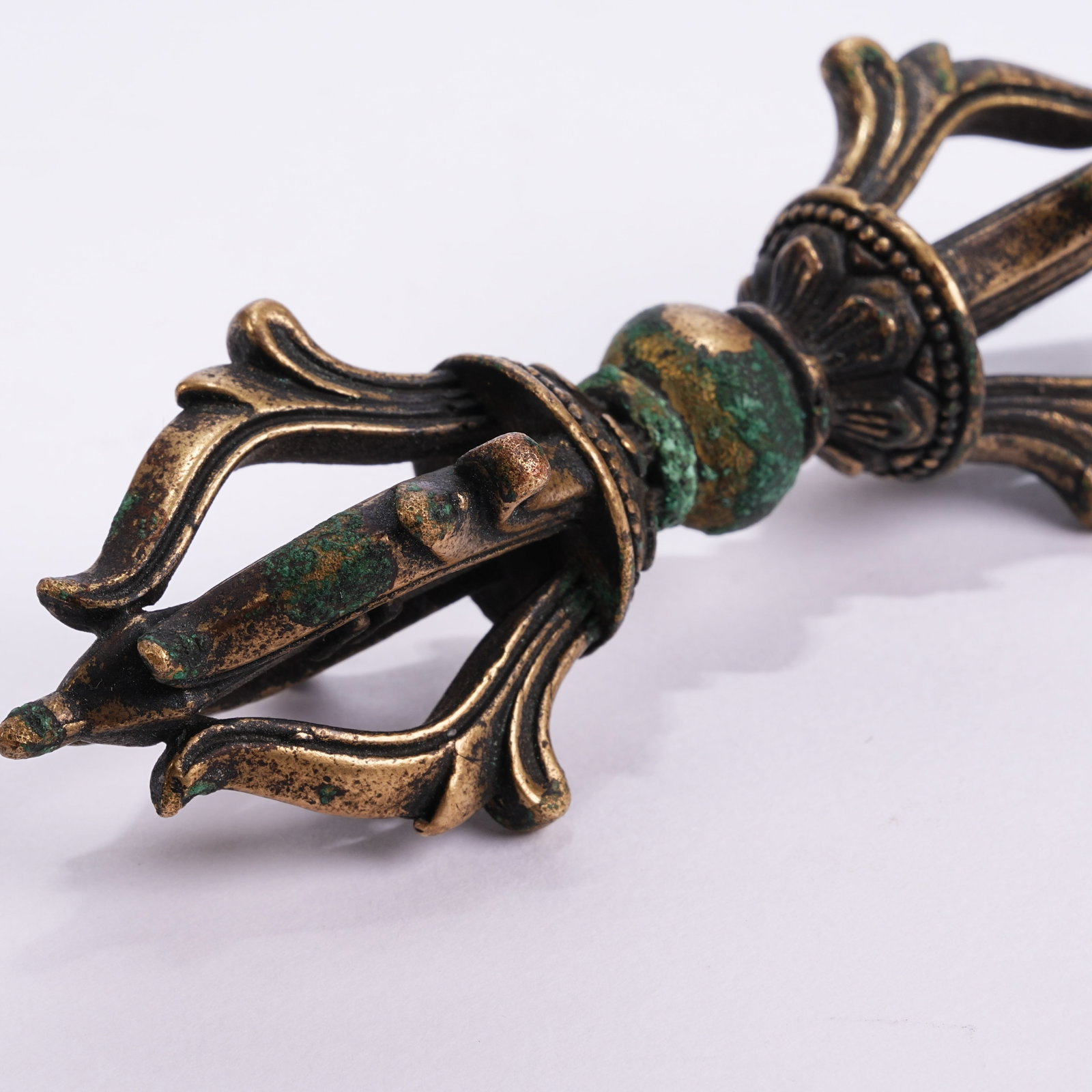 A BRONZE RITUAL IMPLEMENT - 7