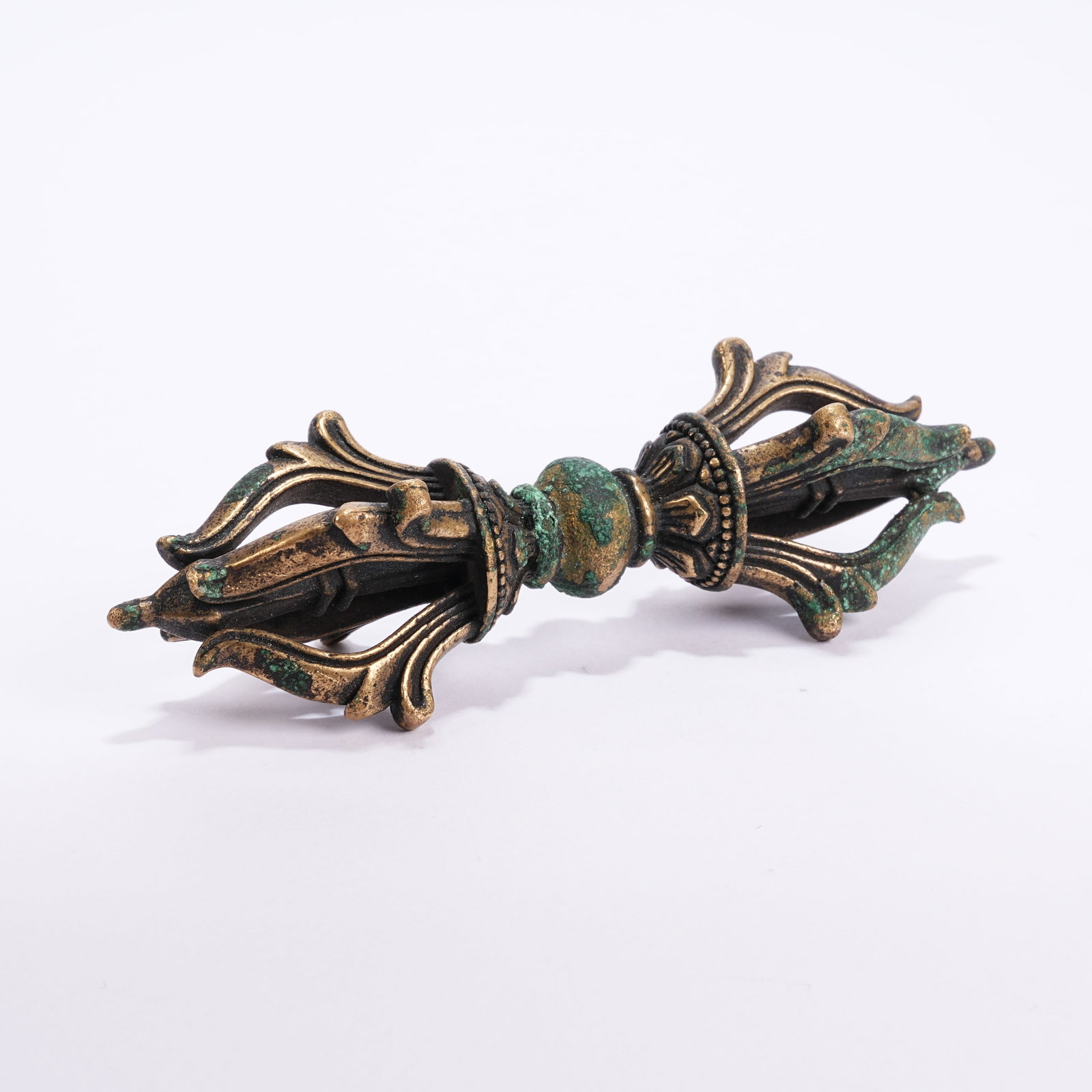 A BRONZE RITUAL IMPLEMENT - 8