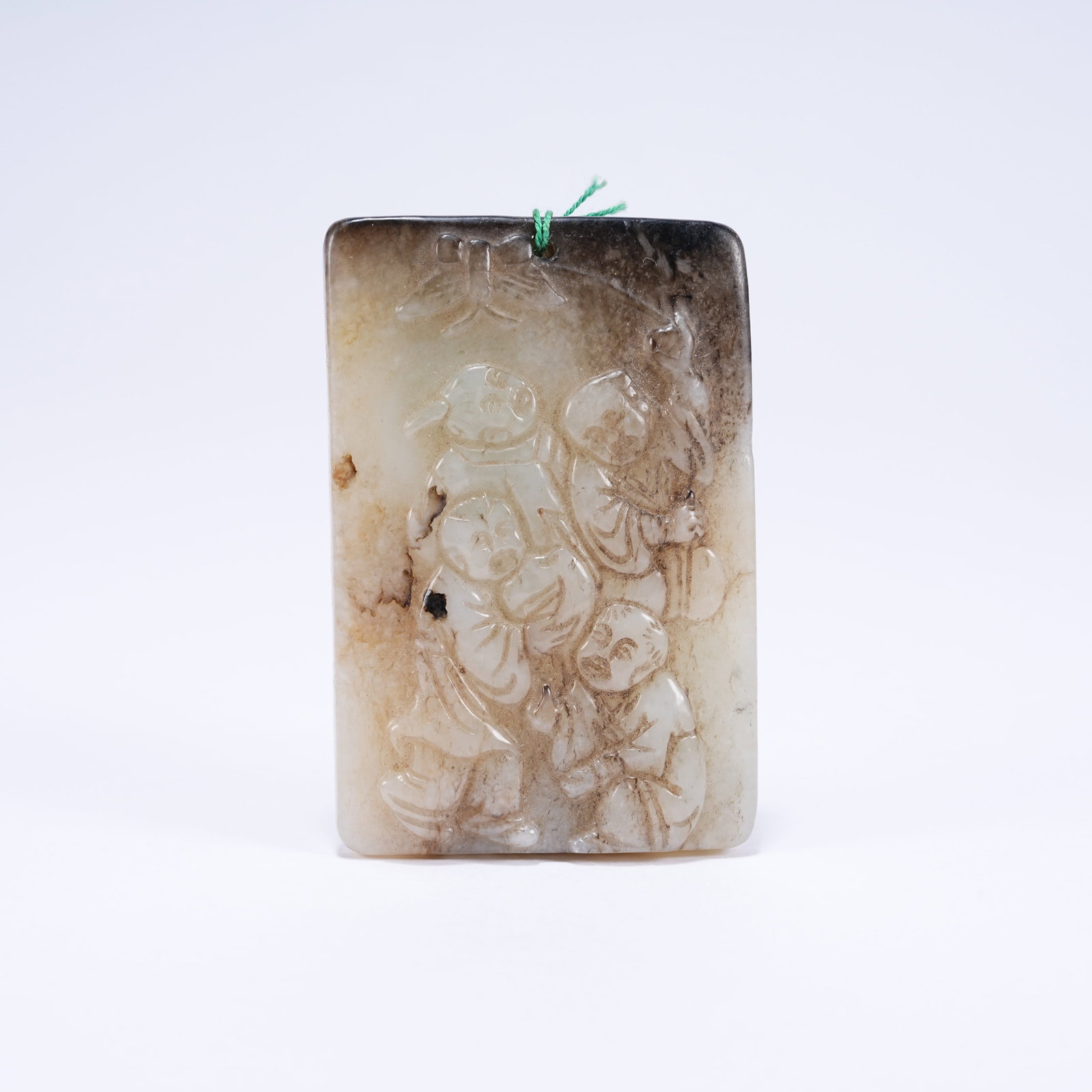 A HETIAN JADE PLAQUE WITH CHILDREN PLAYING PATTERN: Hetian Jade Plaque with Children Playing Pattern