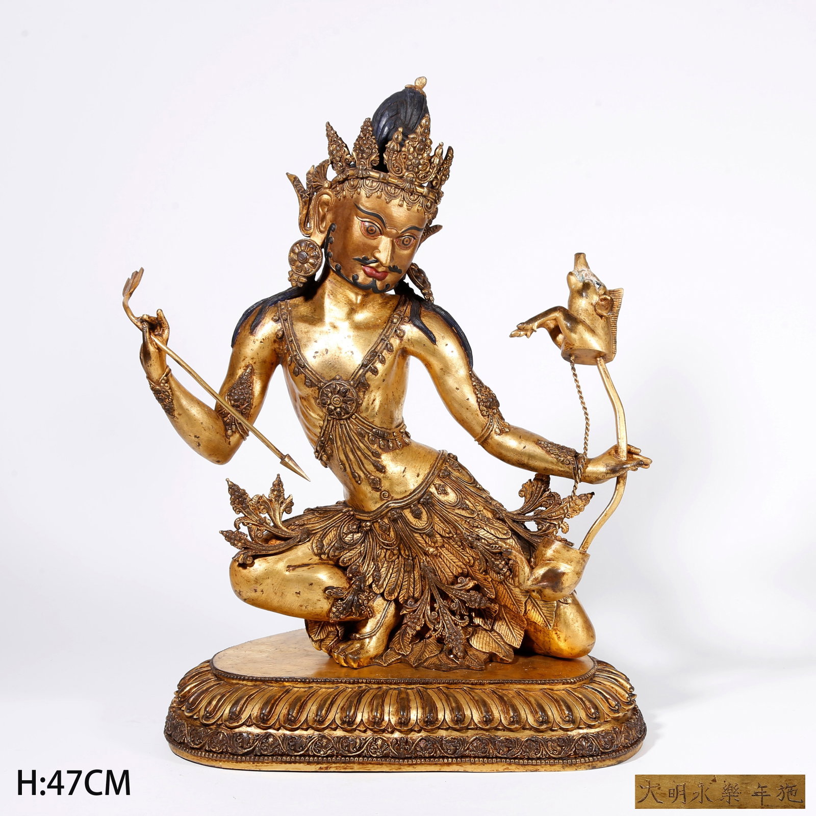 A GILT BRONZE GUARDIAN STATUE: Gilt Bronze Guardian Statue