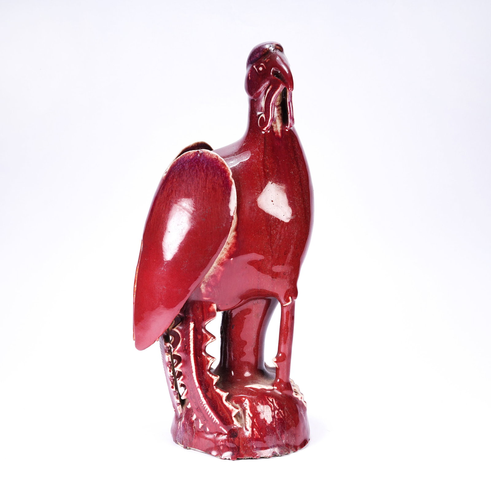 A FLAMBE GLAZED PHOENIX ORNAMENT: Flambe Glazed Phoenix Ornament