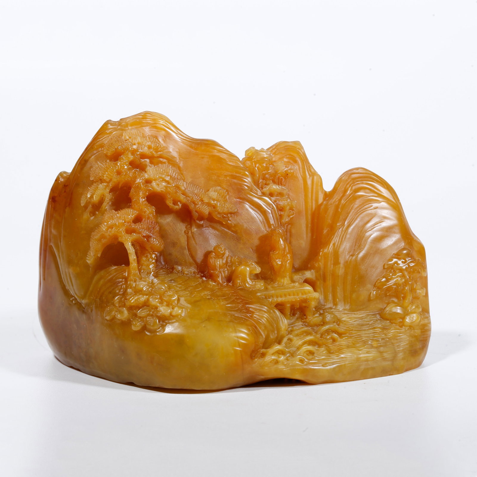 A SEAL CARVED WITH LANDSCAPE AND FIGURE PATTERN FROM SHOUSHAN TIANHUANG STONE: Seal carved with landscape and figure pattern from Shoushan Tianhuang stone