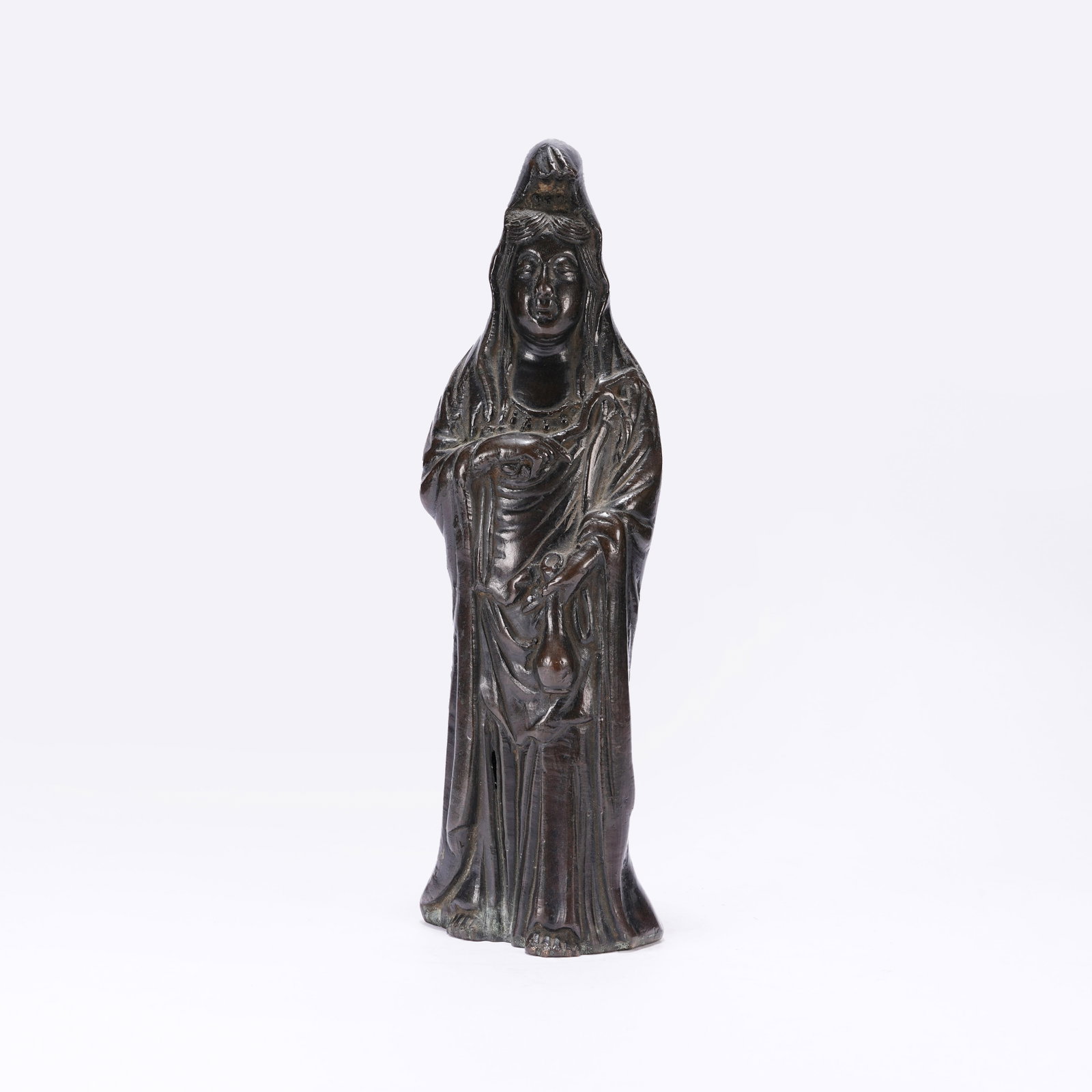 A BRONZE STANDING GUANYIN WITH HOLY VASE (1 of 9)