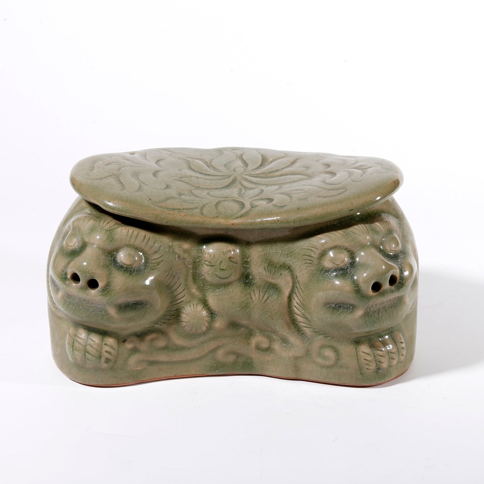 A YAOZHOU KILN TIGER-HEAD PILLOW: Yaozhou Kiln Tiger-head Pillow