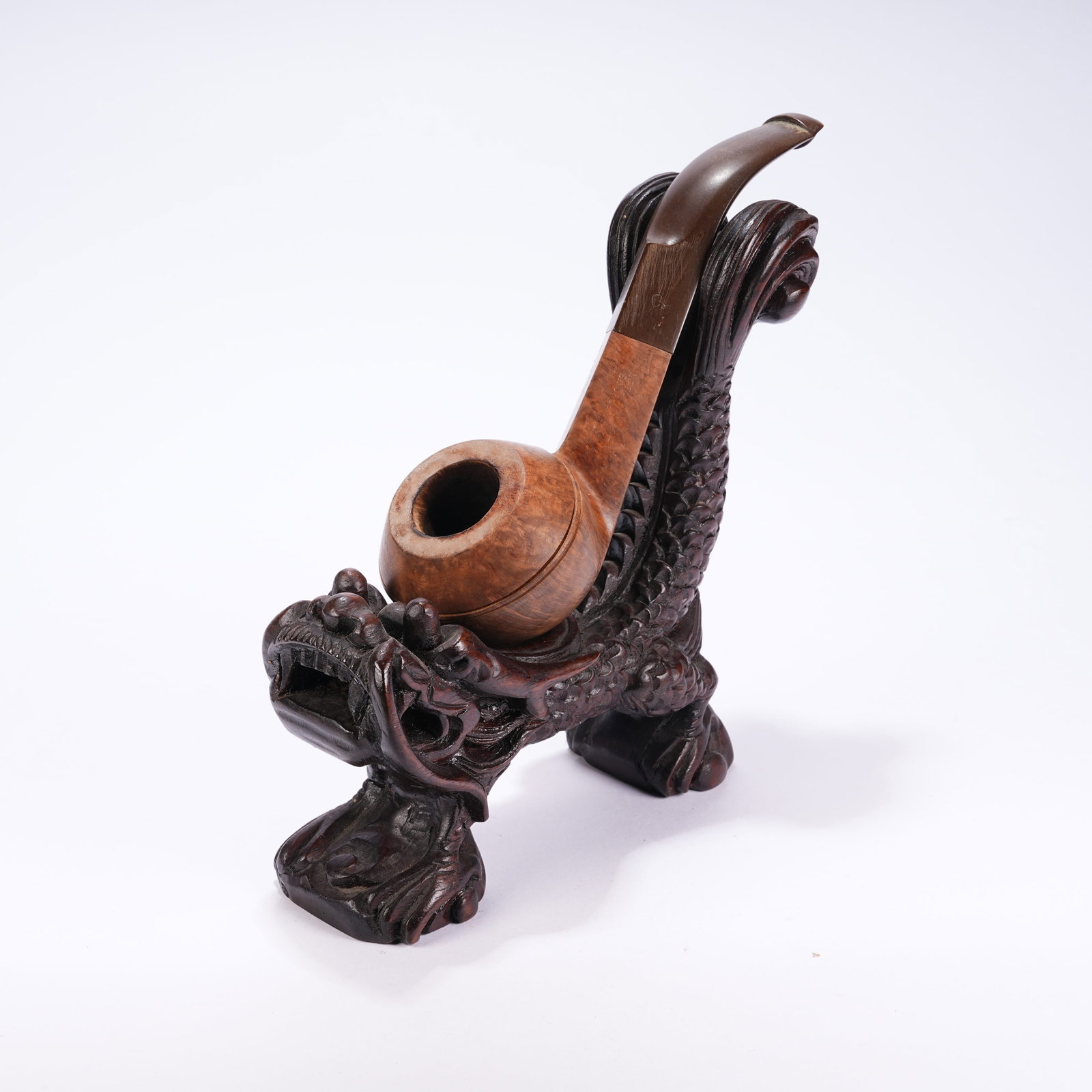 A RED SANDALWOOD DRAGON PATTERN PIPE STAND: Red Sandalwood Dragon Pattern Pipe Stand