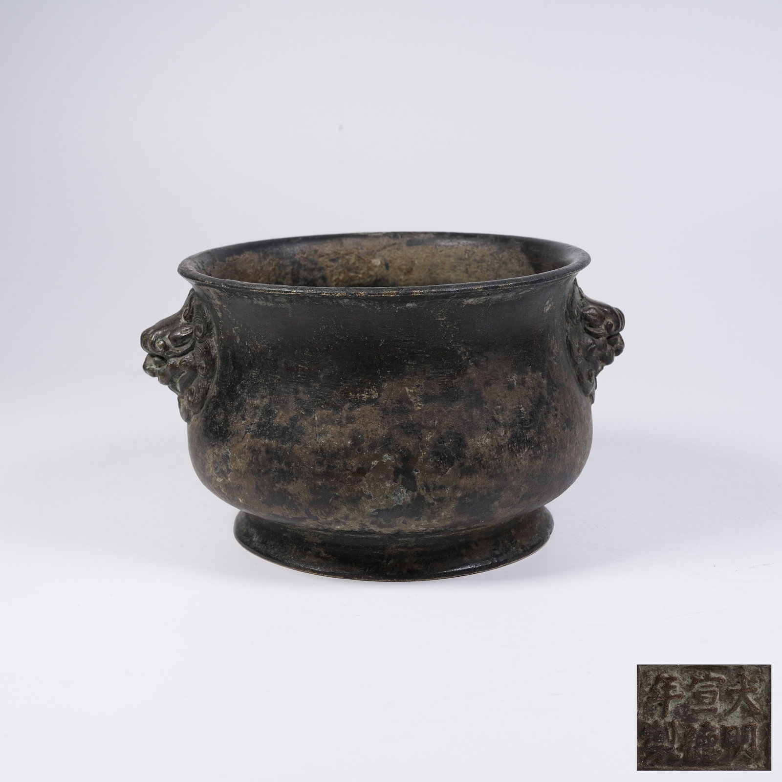 A BRONZE CENSER WITH LION EARS: Bronze Censer with Lion Ears