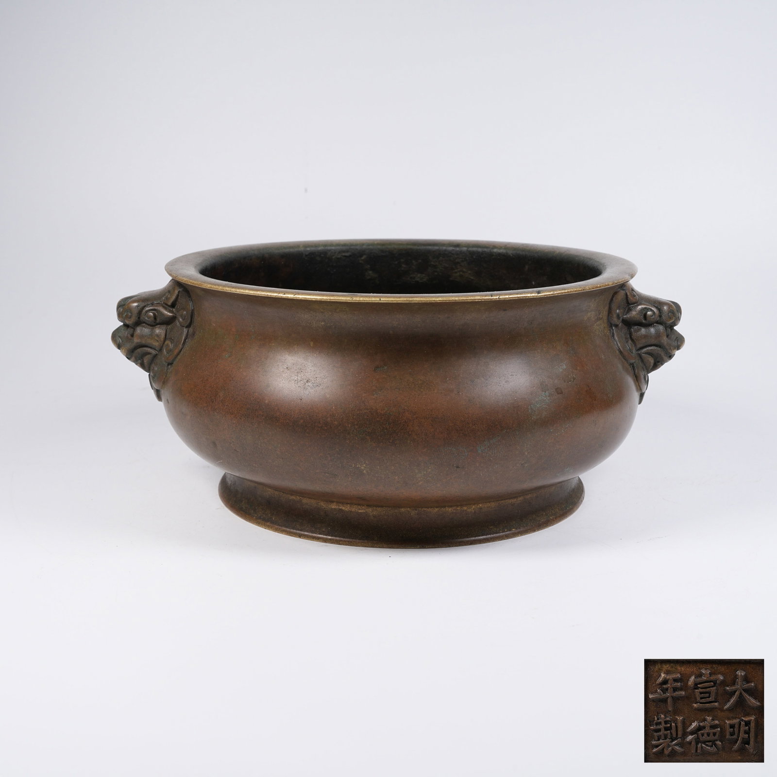 A BRONZE CENSER WITH LION EARS: Bronze Censer with Lion Ears