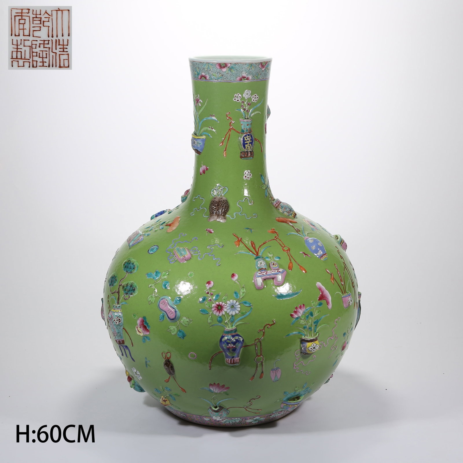 A FAMILLE ROSE CARVED PORCELAIN GLOBULAR VASE WITH ANTIQUITIES PATTERN: Famille Rose Carved Porcelain Globular Vase with Antiquities Pattern