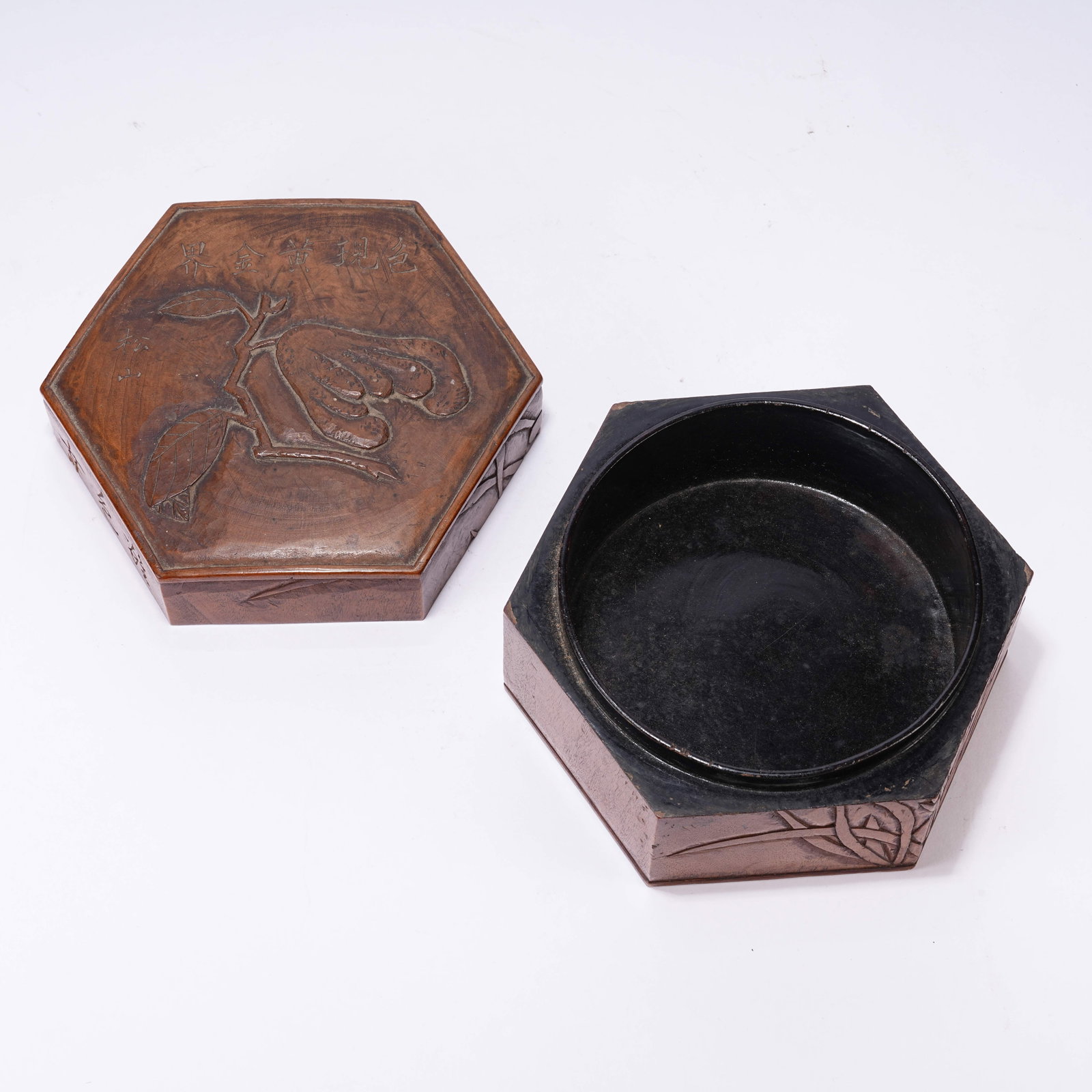 A HEXAGONAL HUANGHUALI LIDDED BOX WITH FLOWER AND FRUIT MOTIFS (1 of 10)