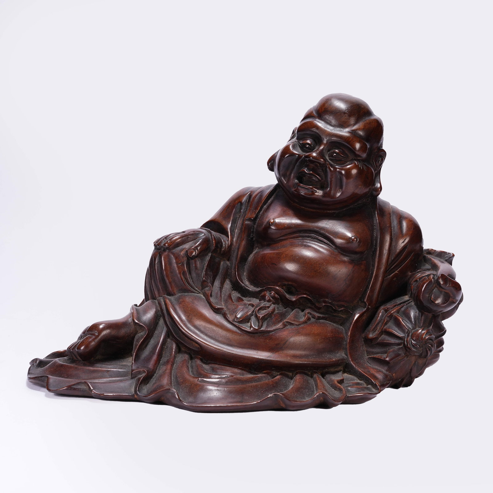 A HUANGHUALI CLOTH BAG MONK ORNAMENT: Huanghuali Cloth Bag Monk Ornament