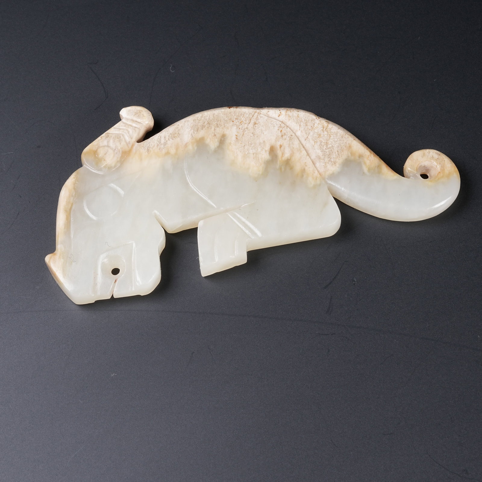 A ANCIENT JADE TIGER TALLY: Ancient Jade Tiger Tally