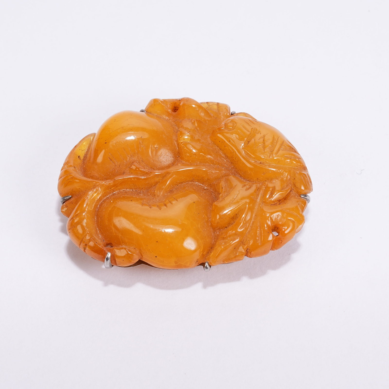 A BEESWAX AUSPICIOUS FRUIT PATTERN BELT ORNAMENT: Beeswax Auspicious Fruit Pattern Belt Ornament