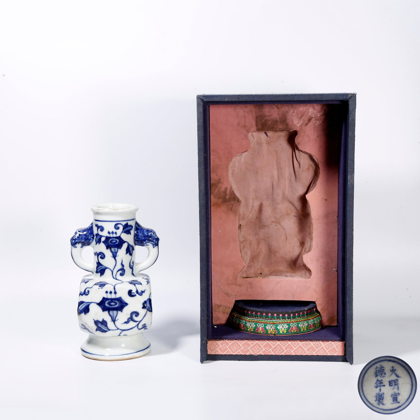A BLUE AND WHITE SQUARE VASE WITH INDENTED CORNERS (1 of 10)