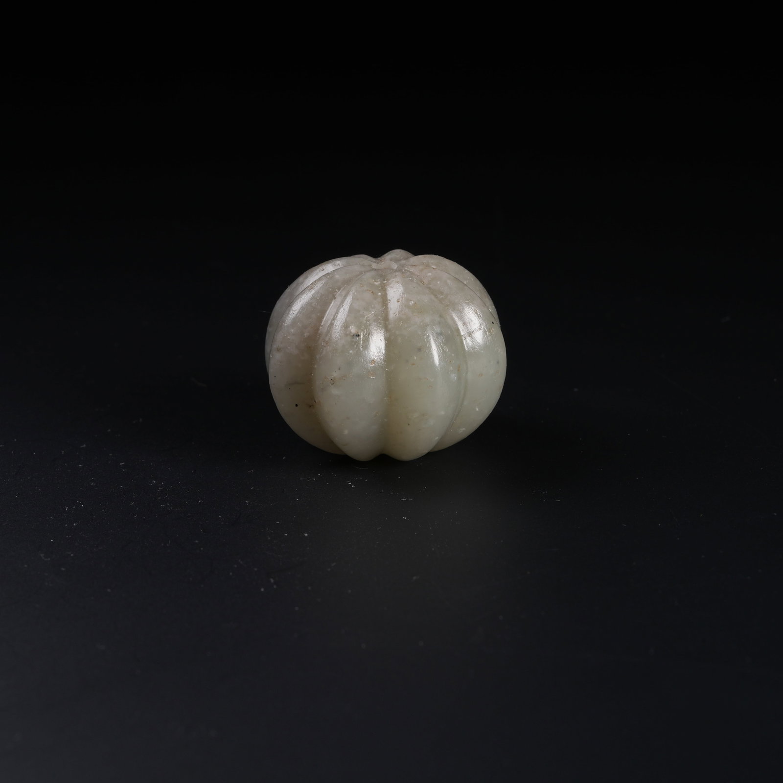 A ANCIENT JADE MELON-RIDGED BEAD: Ancient Jade Melon-ridged Bead
