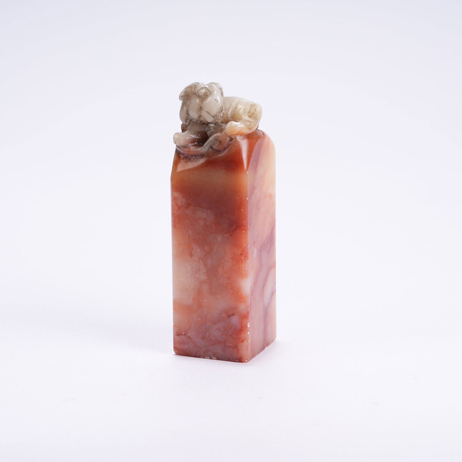 A SHOUSHAN STONE SEAL WITH RECUMBENT RABBIT BUTTON: Shoushan Stone Seal with Recumbent Rabbit Button
