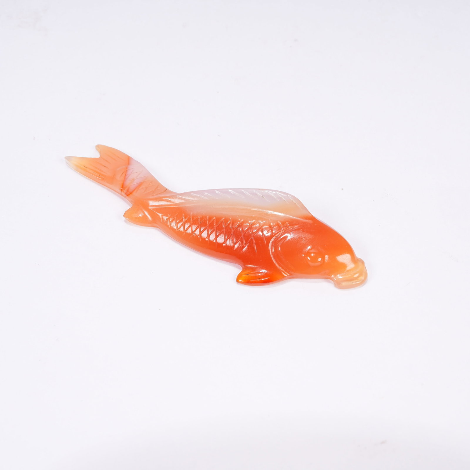 A AGATE ORNAMENT SYMBOLIZING SURPLUS YEAR AFTER YEAR (1 of 8)