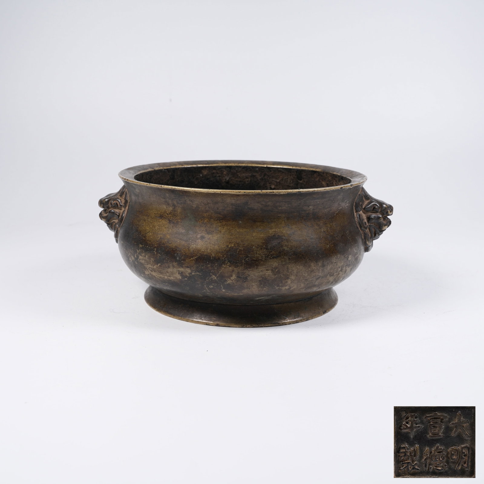 A BRONZE CENSER WITH LION EARS: Bronze Censer with Lion Ears