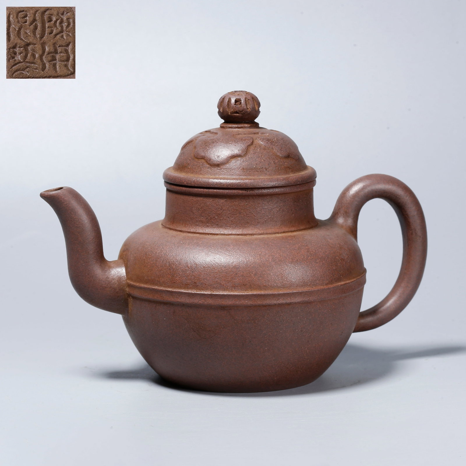 A ZISHA CARVED EWER: Zisha Carved Ewer