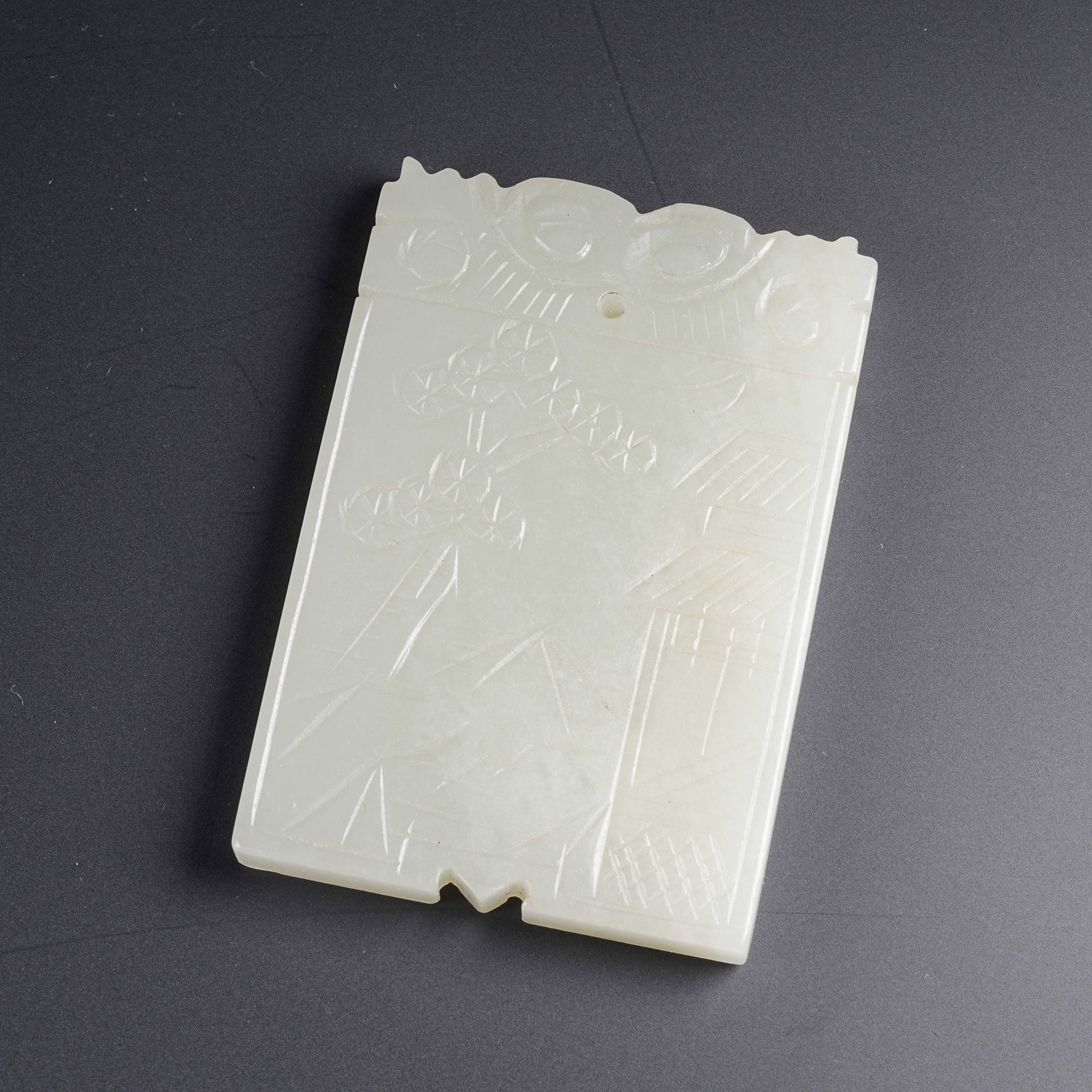 A HETIAN JADE PLAQUE CARVED WITH LANDSCAPES AND PAVILIONS: Hetian Jade Plaque Carved with Landscapes and Pavilions