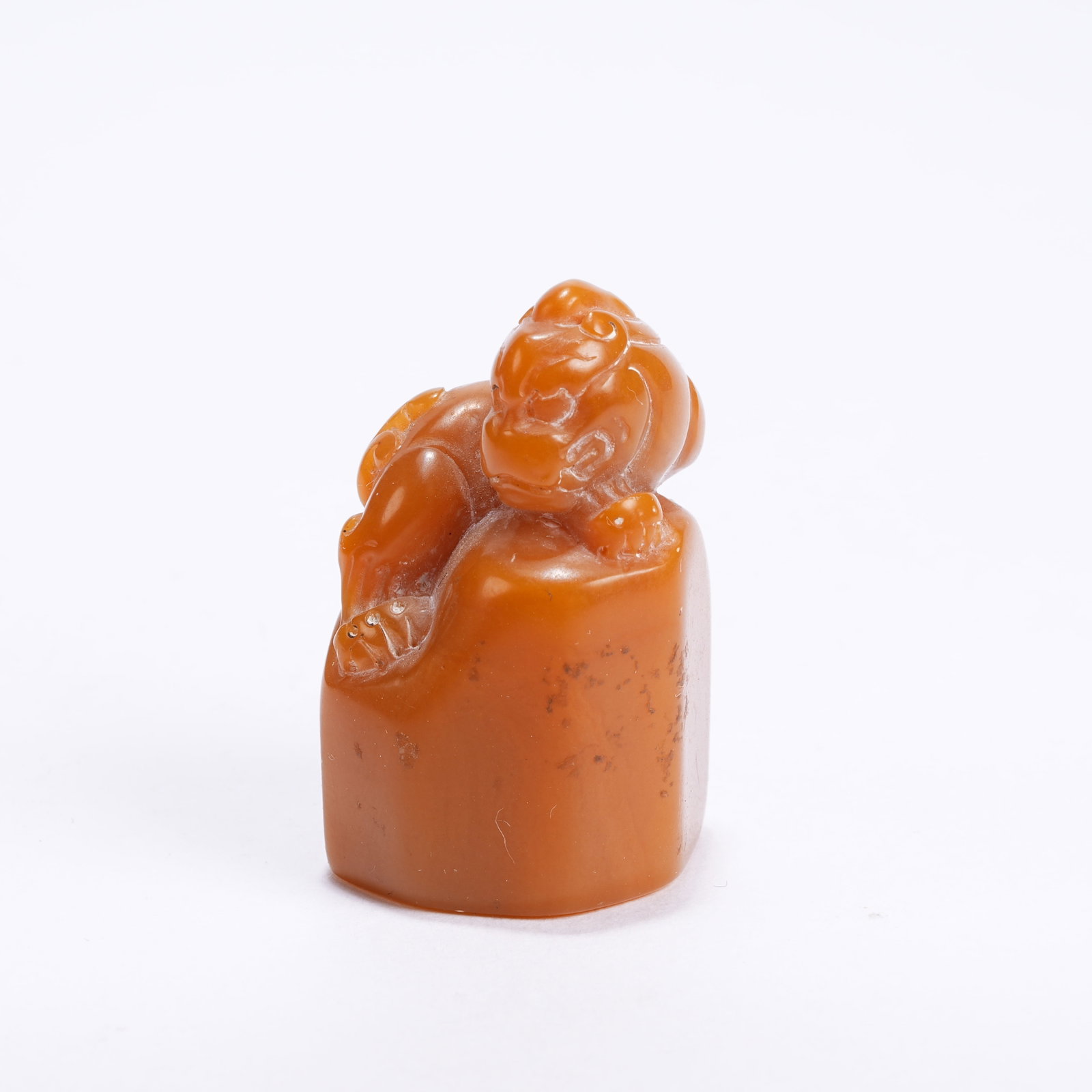 A SHOUSHAN STONE SEAL MATERIAL WITH AUSPICIOUS BEAST BUTTON: Shoushan Stone Seal Material with Auspicious Beast Button