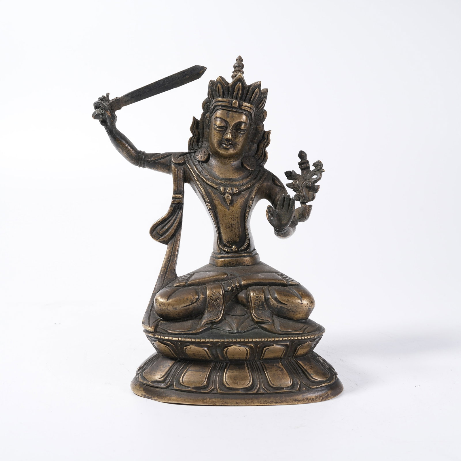 A BRONZE STATUE OF MANJUSHRI BODHISATTVA: Bronze Statue of Manjushri Bodhisattva