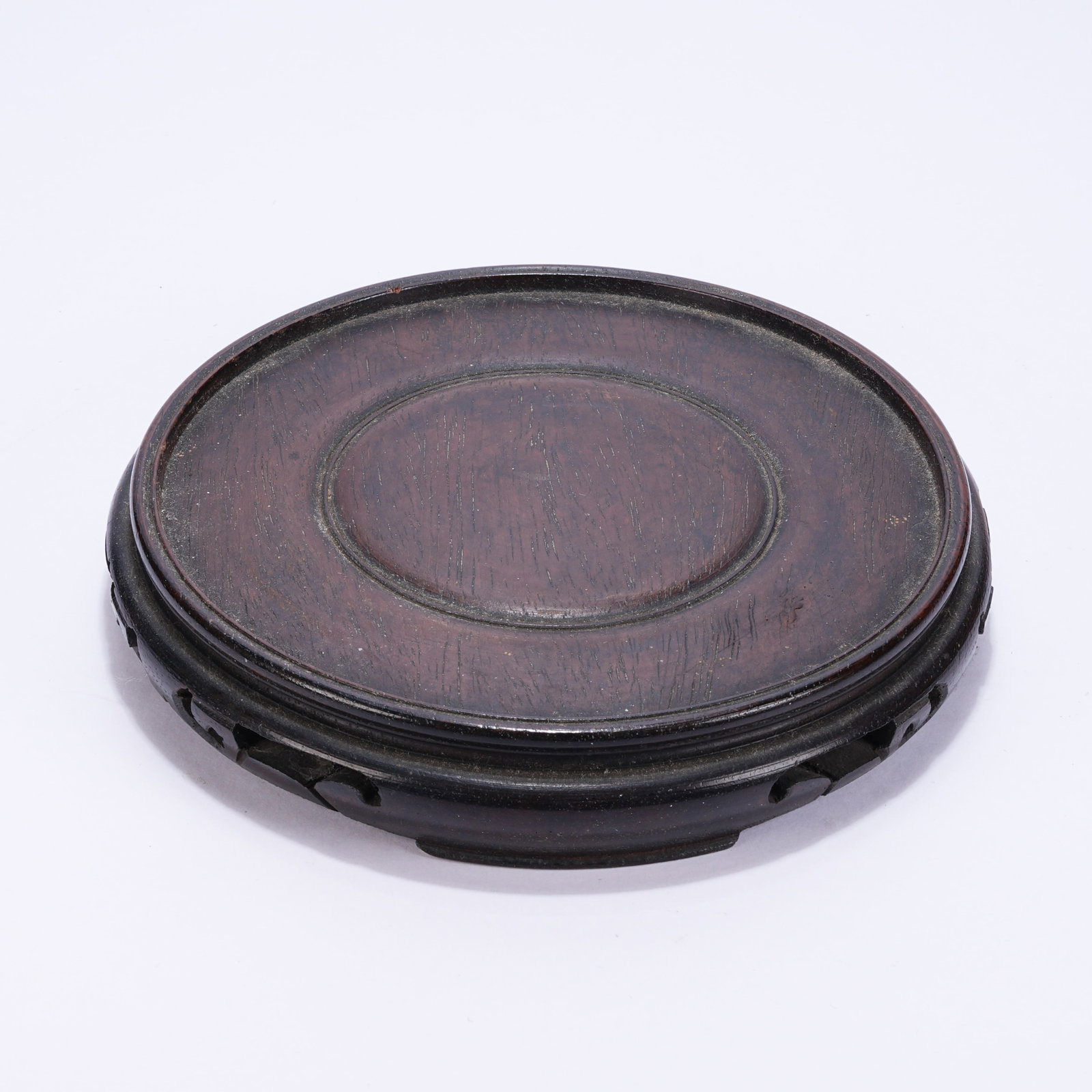 A ROUND HUANGHUALI STAND: Round Huanghuali Stand