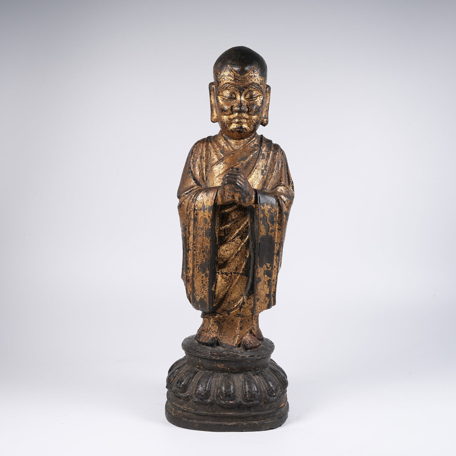 A BRONZE STANDING ARHAT STATUE (1 of 10)