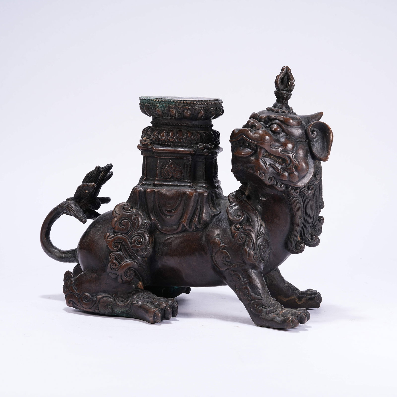 A BRONZE AUSPICIOUS BEAST ORNAMENT: Bronze Auspicious Beast Ornament