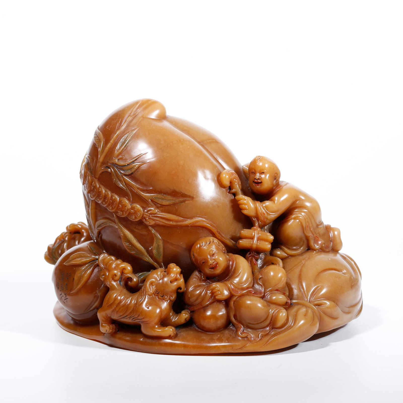 A SHOUSHAN TIANHUANG STONE ORNAMENT OF BOY WISHING LONGEVITY: Shoushan Tianhuang Stone Ornament of Boy Wishing Longevity
