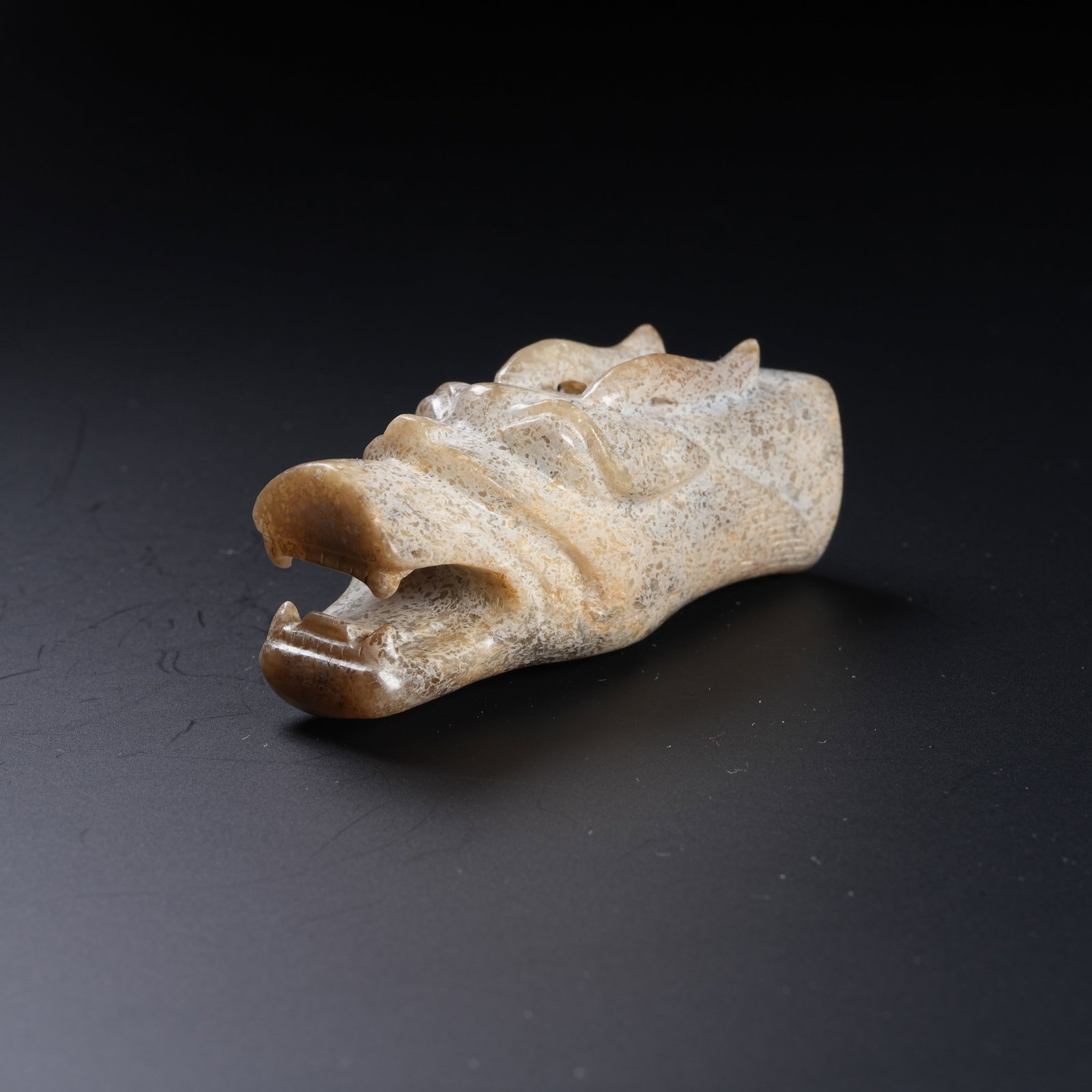 A ANCIENT JADE ORNAMENT WITH DRAGON HEAD (1 of 8)