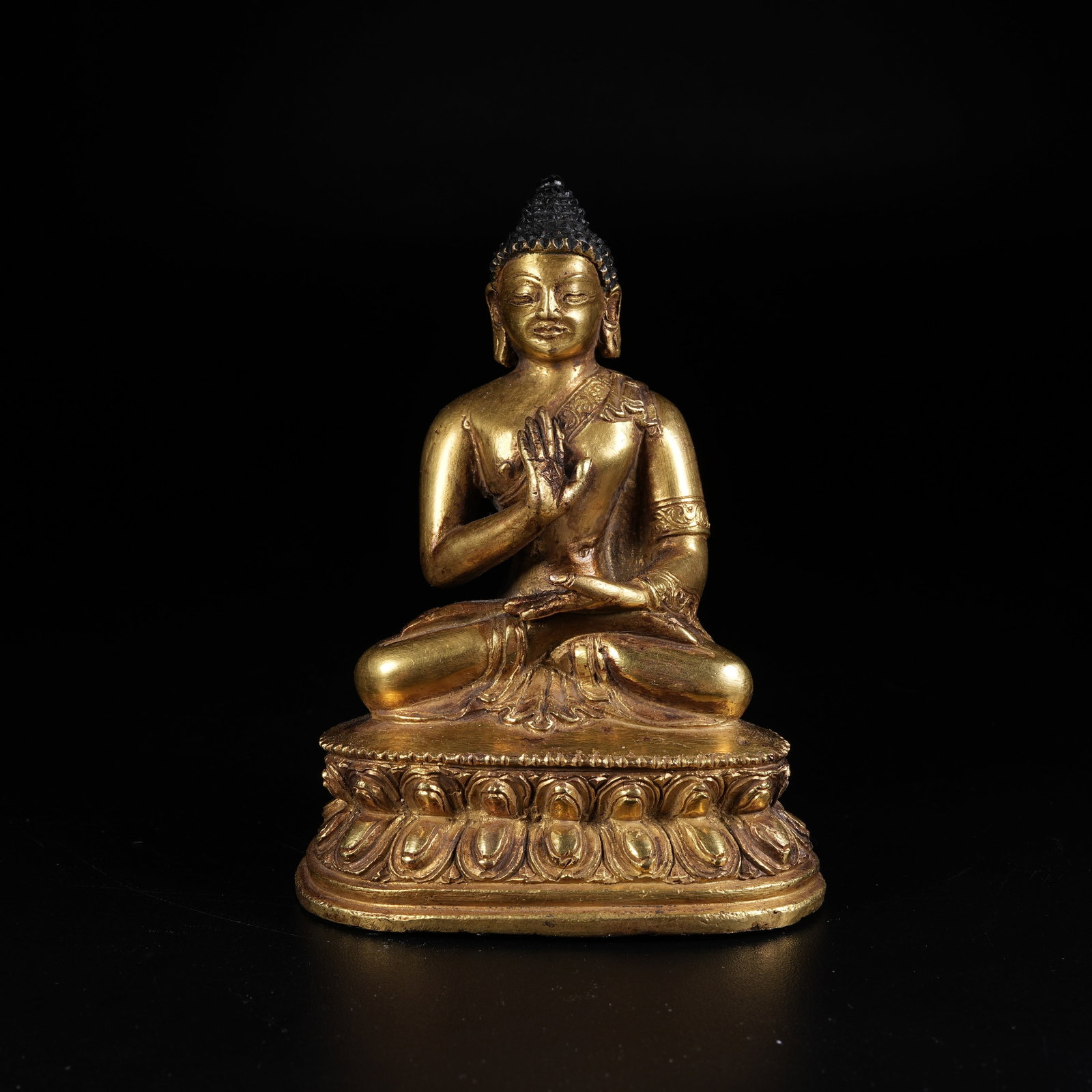A BRONZE SEATED STATUE OF SAKYAMUNI: Bronze Seated Statue of Sakyamuni