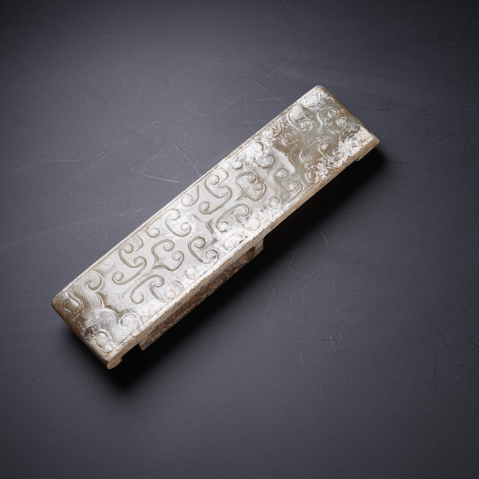 A ANCIENT JADE SWORD GUARD WITH BEAST MASK PATTERNS: Ancient Jade Sword Guard with Beast Mask Patterns